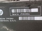 a label on the back of a laptop that is not working