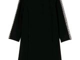 une robe noire avec des bordures blanches sur fond blanc