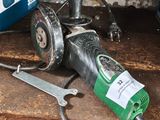 an image of a drill and other tools on a table