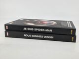 two books sitting on top of each other on a white surface