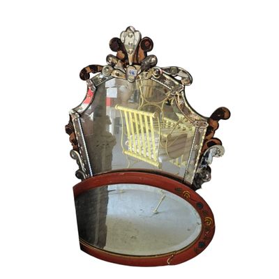a mirror that is sitting on top of a table