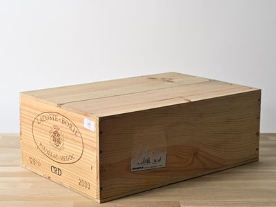 a wooden box that is sitting on a wooden table