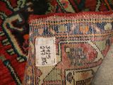 a close up of a rug with a tag on it