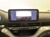 a picture of a car dashboard with a monitor on it