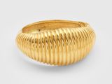 a close up of a gold ring on a white background