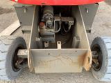 an image of a red tractor with a big wheel