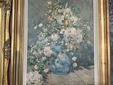 a picture of a picture of a vase of flowers on a table