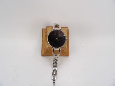 Thierry MUGLER - Montre bracelet en métal et verre.