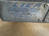 a close up of a machine that is sitting on the ground