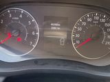 a close up of a car dashboard with a speedometer and gauges