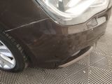 a close up of a car ' s front bumper