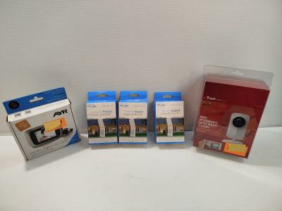 three packages of cameras are sitting next to each other on a table