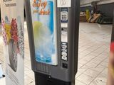 a vending machine that is on display in a building