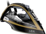 a close up of a black and gold steam iron on a white background