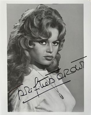 a black and white photo of a woman with long hair