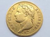an image of a gold coin with a woman ' s head on it
