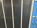 several lockers are lined up in a row in a room