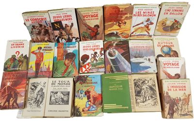a lot of books that are sitting on a table