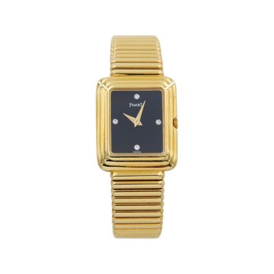 une photo d'une montre-bracelet plaquée or avec un cadran noir