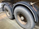 a large truck that is parked on the side of the road