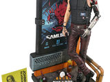 a action figure of a man with a gun on a table