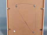 a picture of a picture of a necklace in a wooden box