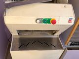 a machine that is sitting in the corner of a room