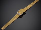 une montre-bracelet en or et diamants, signée Cartier