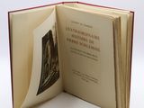 an open book with a picture of a castle on it