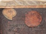 a piece of wood that has a coin on top of it