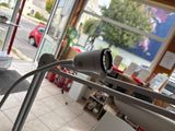 an image of a camera on a tripod in front of a window