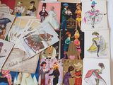 a lot of cards on the table with pictures on them