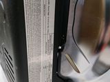 a close up of a toaster on a counter top