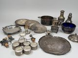 a lot of silver items that are on the table