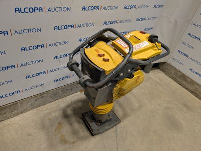 an image of a yellow and black machine in a room