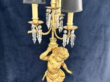 gold plated candelabra with cherenal and crystal chandelier