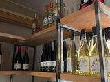 many bottles of wine on the shelves in the room