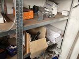 a room with a lot of tools on the shelves