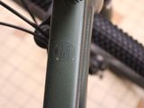 a close up of a bike with a black seatpost