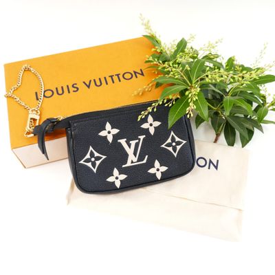 louis vuitton black monograme wrist bag with chain