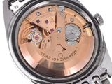 an image of a close up of a watch on a white surface
