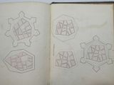 an open book with a drawing of geometric shapes on it