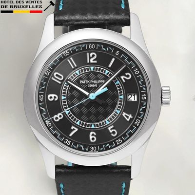 a close up of a black watch with a blue second hand