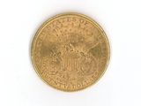 an image of a gold coin on a white surface