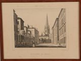 an old picture of a city street with a church steeple in the background