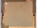 an old picture of a picture frame with a piece of paper taped to it