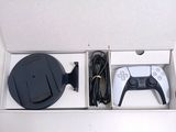 a white box with a game controller inside of it