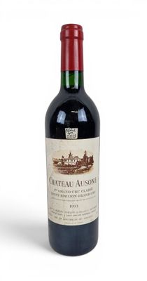 a bottle of wine that is sitting on a table