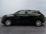 a picture of a black suv parked in a parking lot