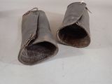 two pairs of shoes that are sitting on a table